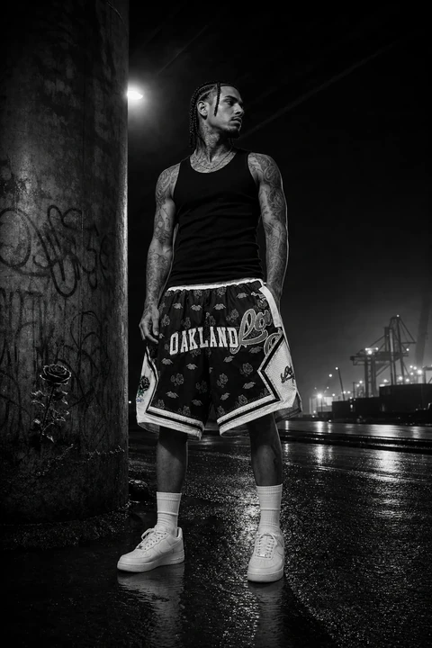 BLACK Rose x Love Hurts Basketball Shorts — front on model