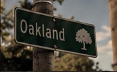 Oakland sign detail from the founder-selected design reference.